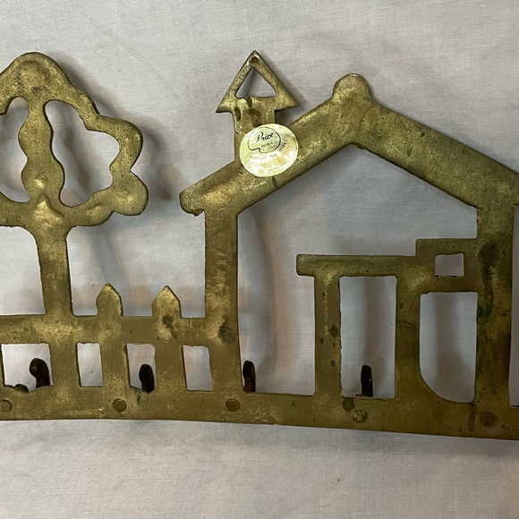 Vintage solid brass wall key holder. Design is of a home, picket fence and tree. - Picture 7 of 9
